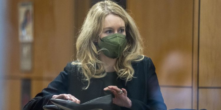 Elizabeth Holmes says Theranos’ former president abused her