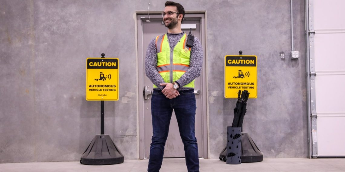 Robots outnumber human workers in this autonomous truck yard north of Denver