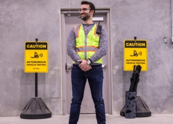 Robots outnumber human workers in this autonomous truck yard north of Denver
