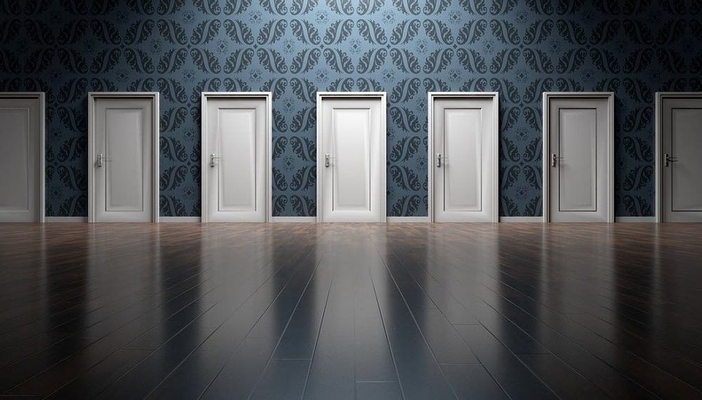 Autonomous Robot Finds and Opens Doors While Recharging Itself