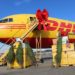 DHL Operation Holiday Cheer delivers hundreds of Christmas trees and more to U.S. troops overseas