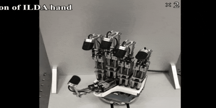 This Robotic Hand Is Precise Enough to Move a Microchip With Tweezers
