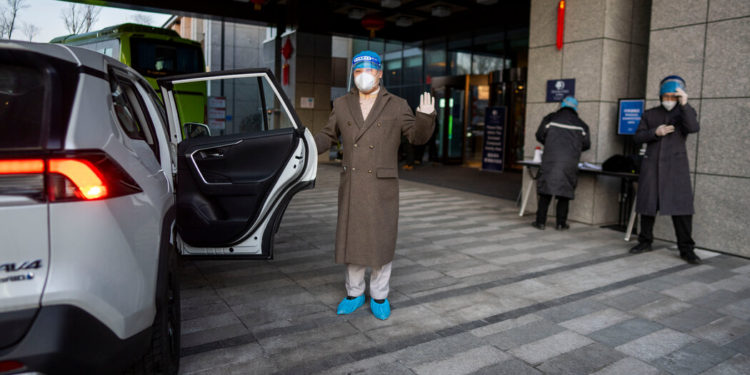 Inside Beijing’s Olympic Bubble: Robots, Swabs and a Big Gamble
