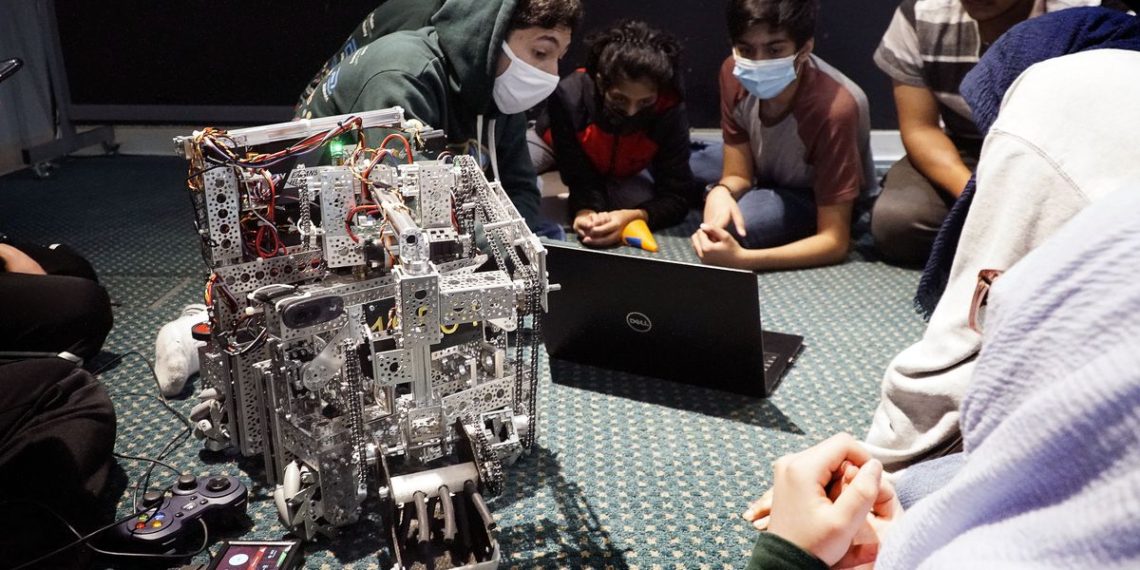 Scientist has formed four robotics teams for North Texas youths