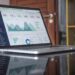 laptop on glass table